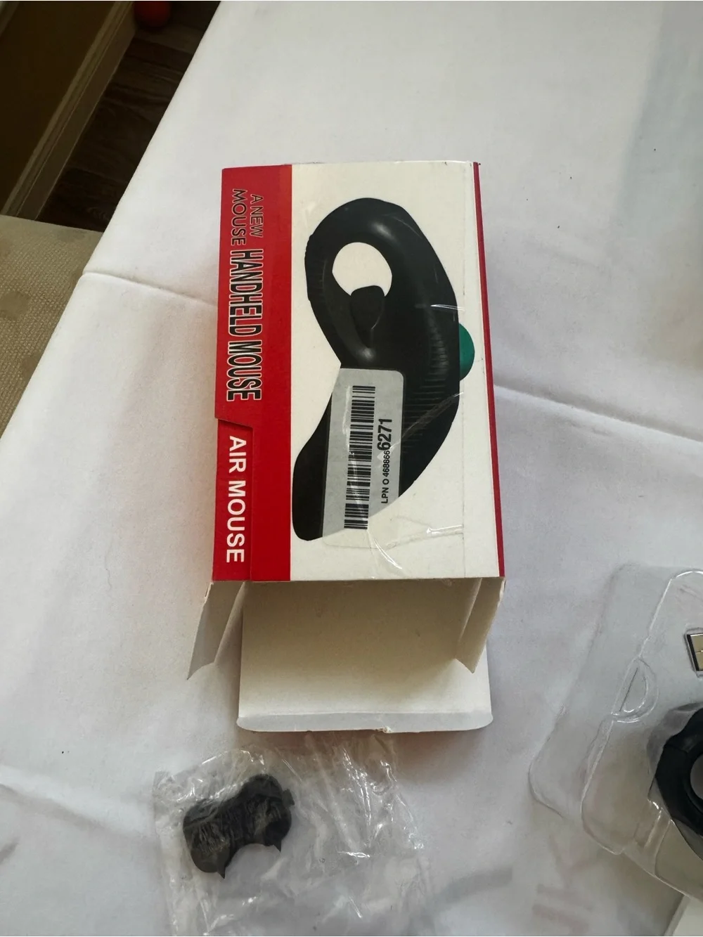 Ergonomic Black Handheld Trackball Mouse with Teal Ball